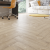 Кварцвиниловый SPC ламинат Alpine Floor Parquet Premium Дуб Дуб Медия ECO 19-20 венгерская елка 600×125×8 фото в интерьере