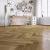 Кварцвиниловый SPC ламинат Fargo Parquet Дуб Робуста 33-81996-9 венгерская елка 615×123×4 фото в интерьере