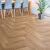 Кварцвиниловый SPC ламинат Floor Factor Herringbone Tobacco Braun Oak HB.15 венгерская елка 675×135×5 фото в интерьере