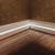 Плинтус МДФ под покраску Evrowood PN 060 Led с подсветкой 2000×83×12 фото в интерьере