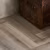 Кварцвиниловый SPC ламинат Vinilam Parquet Herringbone Паркет Эрмитаж IS11122 венгерская елка 720×120×6,5 фото в интерьере