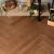 Кварцвиниловый SPC ламинат Vinilam Parquet Herringbone Паркет Винсент IS11200 венгерская елка 720×120×6,5 фото в интерьере