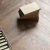Кварцвиниловый SPC ламинат Vinilam Parquet Chevron Шеврон Нормандия RI153610CL4 французская елка 1293×305×8,5 фото в интерьере