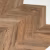 Кварцвиниловый SPC ламинат Vinilam Parquet Chevron Шеврон Нормандия RI153610CL4 французская елка 1293×305×8,5 фото в интерьере