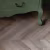 Кварцвиниловый SPC ламинат Vinilam Parquet Chevron Шеврон Шампань RI153616CL4 французская елка 1293×305×8,5 фото в интерьере