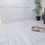 Кварцвиниловый SPC ламинат Aquafloor Parquet Plus AF6016PQ венгерская елка 720×120×7 фото в интерьере