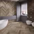 Кварцвиниловый SPC ламинат Damy Floor Chevron Сен-Жермен DF05-Ch французская елка 600×127×5 фото в интерьере
