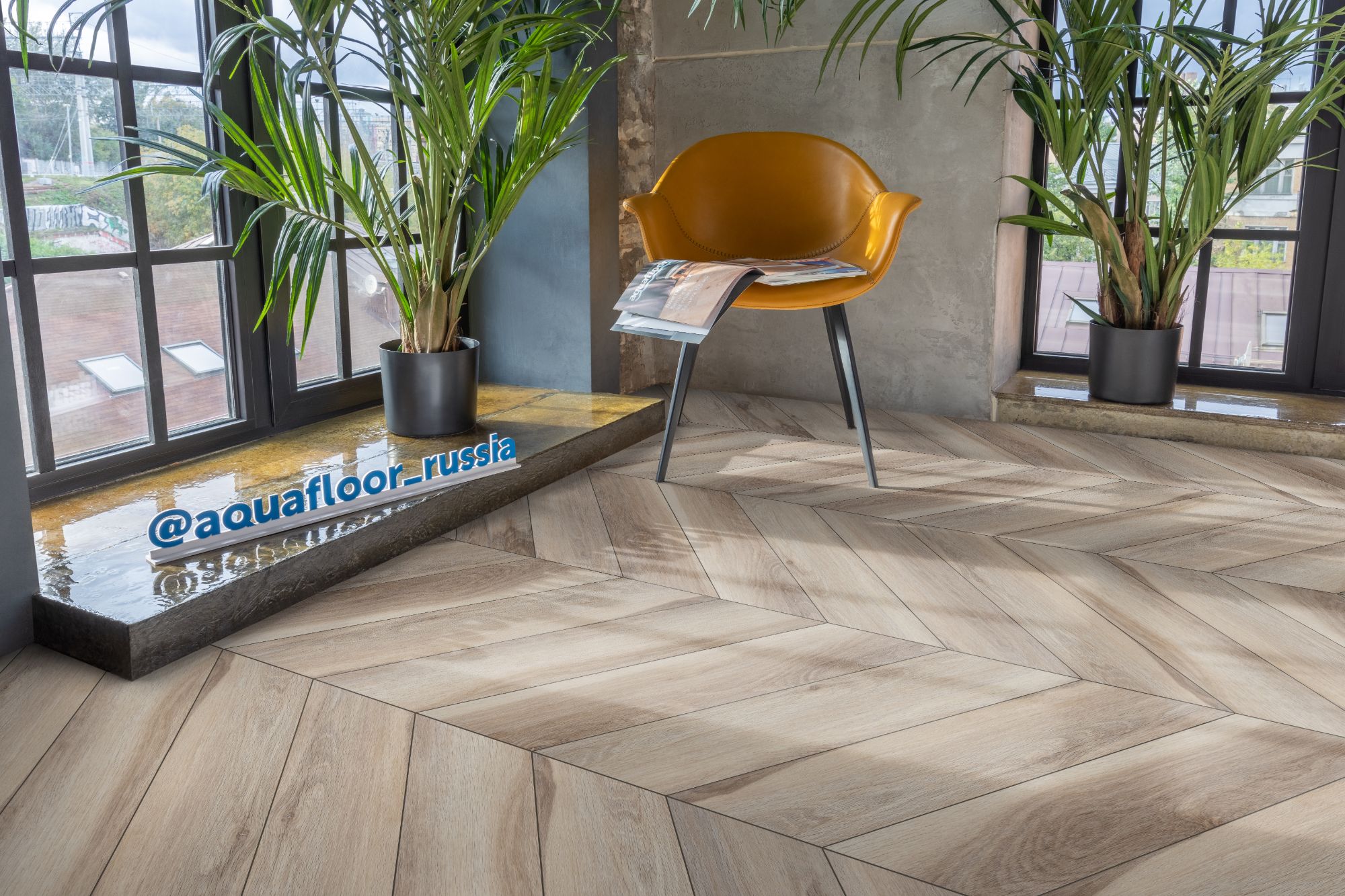 Кварцвиниловая плитка Aquafloor клеевая Parquet Chevron Glue AF2551PGCh французская елка 553,7×130,5×2,5 фото в интерьере