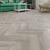 Кварцвиниловая плитка Alpine Floor клеевая Chevron Alpine LVT Дуб Фантазия Chevron ECO 20-1 французская елка 555×127×2,5 фото в интерьере