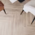 Кварцвиниловый SPC ламинат Vinilam Parquet Herringbone Паркет Монпелье IS11355 венгерская елка 720×120×6,5 фото в интерьере