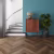 Кварцвиниловый SPC ламинат Invictus Maximus Herringbone Highland Oak Chocolate венгерская елка 743×145×5 фото в интерьере