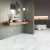 Кварцвиниловый SPC ламинат Invictus Primus Tile Pure Marble Snow 907×450×4 фото в интерьере