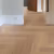 Паркетная доска Auswood Travel Herringbone Oak Amalfi NFH390 HB АBСD венгерская елка 600×125×12 фото в интерьере
