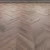 Кварцвиниловая плитка Vinilam клеевая Parquet Chevron Glue Шеврон Нормандия RI153610CL4 французская елка 690×115×2,5 фото в интерьере