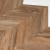 Кварцвиниловая плитка Vinilam клеевая Parquet Chevron Glue Шеврон Нормандия RI153610CL4 французская елка 690×115×2,5 фото в интерьере