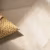 Кварцвиниловая плитка Vinilam клеевая Parquet Chevron Glue Шеврон Сезар RI4445118CL4 французская елка 690×115×2,5 фото в интерьере