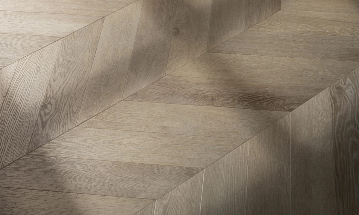 Кварцвиниловая плитка Vinilam клеевая Parquet Chevron Glue Шеврон Сезар RI4445118CL4 французская елка 690×115×2,5 фото в интерьере