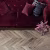 Кварцвиниловая плитка Vinilam клеевая Parquet Chevron Glue Шеврон Лувр I107516 французская елка 690×115×2,5 фото в интерьере