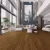 Кварцвиниловый SPC ламинат Evofloor Оптима Орех Американский Walnut American 567-1 1120×184×4,2 фото в интерьере