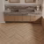 Кварцвиниловая плитка Norland клеевая Parquet S LVT Taymyr 1056-1 венгерская елка 590×118×2,5 фото в интерьере