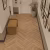 Кварцвиниловая плитка Norland клеевая Parquet S LVT Valday 1056-2 венгерская елка 590×118×2,5 фото в интерьере