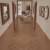 Кварцвиниловая плитка Norland клеевая Parquet S LVT Senezh 1056-5 венгерская елка 590×118×2,5 фото в интерьере