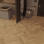 Ламинат Norland Herringbone Elegant 10 Дуб Хайнан LF306-09 венгерская елка 600×100×10 фото в интерьере