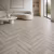 Кварцвиниловый SPC ламинат Tarkett Art Vinyl Ambient House Nadia 257070002 венгерская елка 675×135×4,1 фото в интерьере