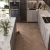 Кварцвиниловый SPC ламинат My Step Стоун Херрингбон Stone Herringbone Дуб Бромо MS8418 венгерская елка 564×141×8 фото в интерьере