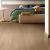 Ламинат CliX Floor Charm Дуб Карамель CXC162 фото в интерьере